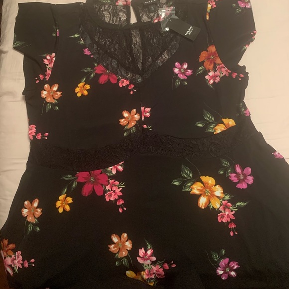 Torrid peplum floral top. - Picture 3 of 3